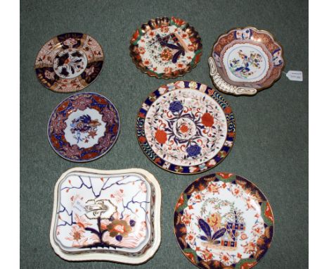 A Spode Imari pattern shell-shaped dish, two Copeland and two Spode Ironstone plates, a Derby Imari plate and a Derby oblong 