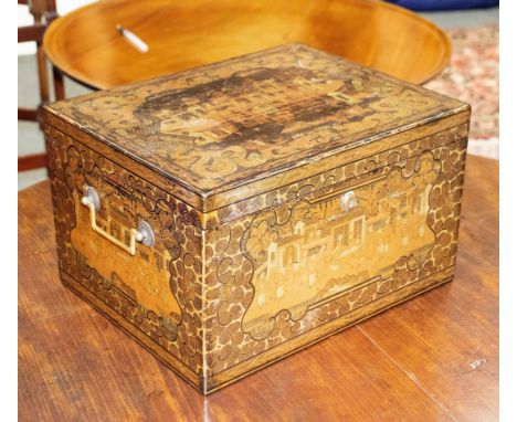 A 19th Century chinoiserie tea caddy, decorated all over with buildings, dragons etc., fitted an engraved zinc lined canister