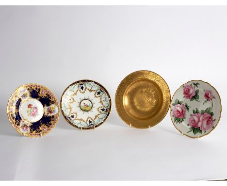 A group of four English porcelain plates, mid to late 19th Century, comprising, a Royal Worcester gilt ground soup plate, too