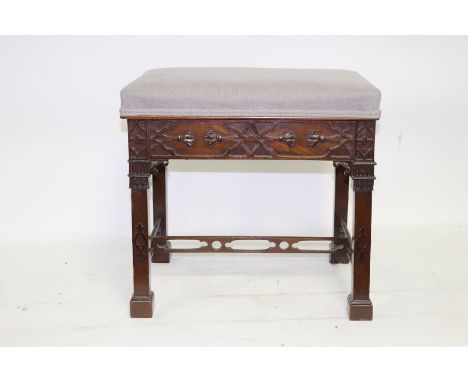 A rectangular mahogany stool of Chinese Chippendale design, 51cm wide