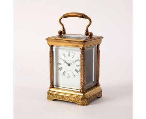 A small gilt brass and engraved carriage clock, Elliott & Son, London, 11cm high CONDITION REPORT: The timepiece has been wor