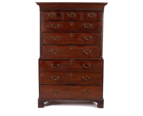 An 18th Century mahogany tallboy chest with arrangement of three short and six long drawers flanked by canted sides with blin