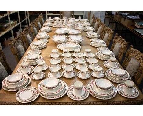An extensive Royal Worcester Holly Ribbons pattern dinner service, eighteen settings and with four tureens and covers, four s