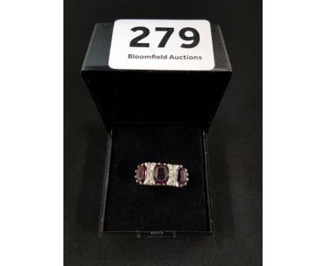 SILVER AMETHYST AND WHITE STONE RING 