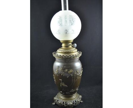 An oil lamp formed from a Japanese bronze vase with multi-metal applique, depicting cranes and prunus blossoms - height to to