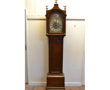 A late 18th Century oak longcase clock, arched brass dial inscribed 'Rich. Smith Newport', dolphin and urn castings to dial, 