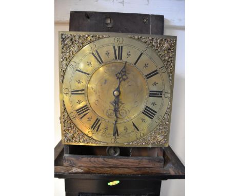 An 18th/early 19th Century pine longcase clock, 30cm square brass dial with urn spandrels, engraved Wm Briston Haslemere, thi