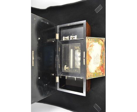 A late 19th/early 20th century musical box playing six airs, decorated rosewood effect case, handwritten playlist no. 76082-3