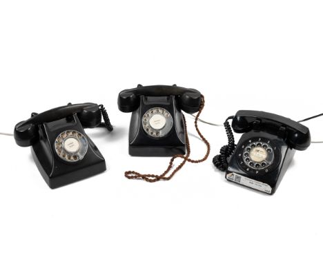 Three 20th-Century telephones The first two, black bakelite phones; and a later plastic phone