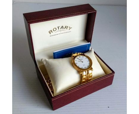 A cased Rotary Elite gents wristwatch with baton numerals, date aperture on a gold plated bracelet strap 