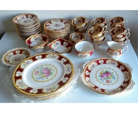 A 66-piece Royal Albert Lady Hamilton tea and part-dinner service comprising 16 cups (chip to one cup), 18 saucers/side plate