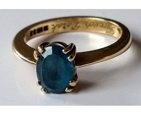 A mid-20th century oval-cut opal ring in a 9ct yellow gold claw setting, hallmarked, size O, 3.5g 