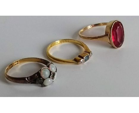 An Art Deco opal and peridot cluster ring on an 18ct yellow gold setting, size O, 2.54g, hallmarked; a similar yellow metal g