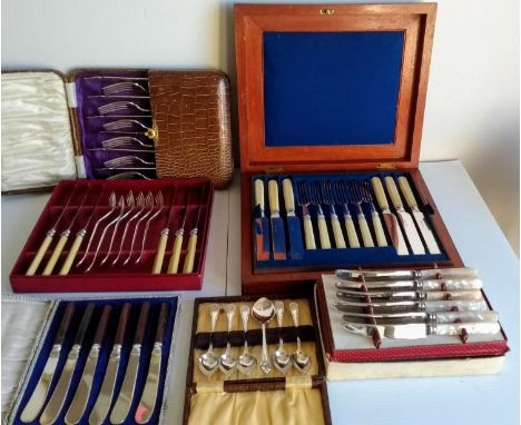 An assortment of early 20th century silver plated flatware, some cased, to include a Mappin &amp; Webb ladle and set of six s