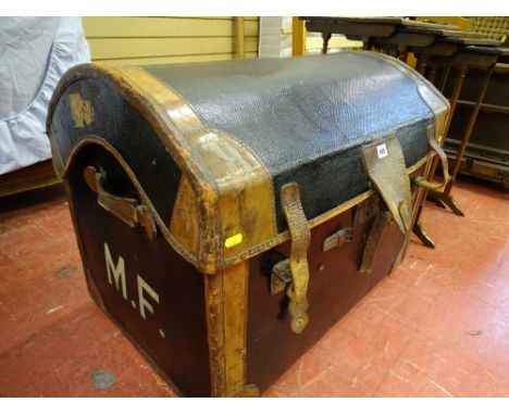 Fine dome topped leather bound trunk, marked 'M F'