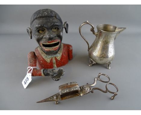Painted Dinah cast metal moneybox, a pair of vintage candle snuffers etc