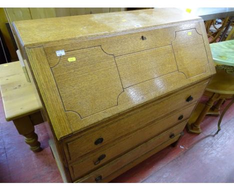 Light oak three drawer bureau