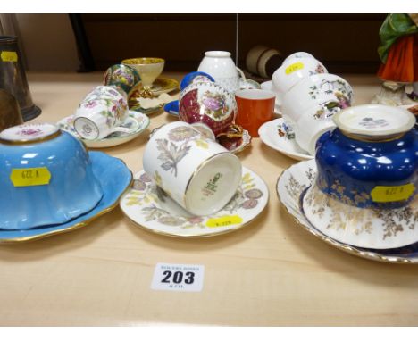 Assortment of cabinet cups and saucers