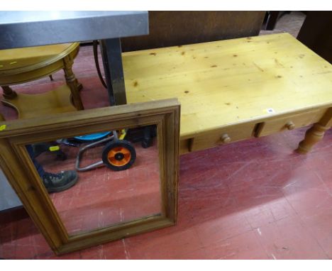 Pine coffee table with two small drawers and a pine framed mirror