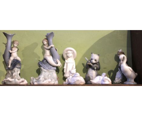 A pair of Nao sea creature candlesticks, together with other Nao items, including ducks