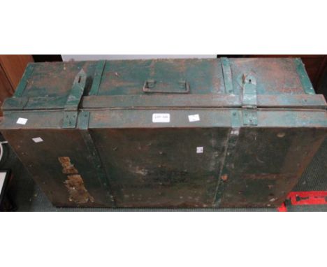 A green painted vintage tin travel trunk
