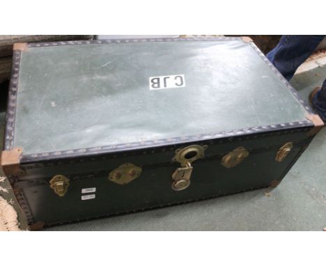 A substantial green vintage travel trunk, brass fittings &amp; studs