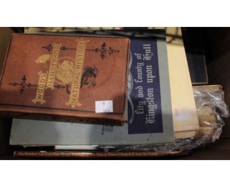A box containing a selection of vintage books