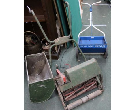 A vintage ATCO lawnmower together with a Fisons lawn spreader