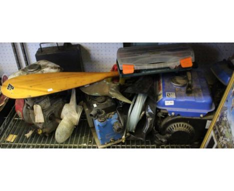 A shelf containing a compressor, boat engine, etc