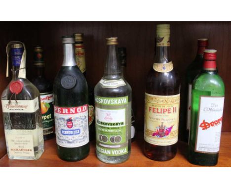 Ten bottles of assorted spirits to include vodka, whisky and pernod