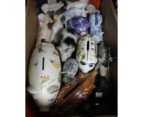 A Wemyss black &amp; white pig, together with a large collection of pigs and other animals, Wemyss pig has loss to his left f