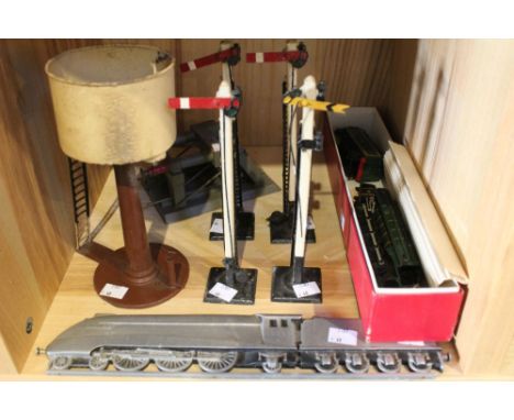 A selection of O gauge model railway accessories, signals, a buffer and a water tank. Plus a metal plaque example of "Mallard