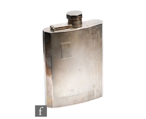 A hallmarked silver rectangular hip flask with engine turned decoration to whole, weight 5.5oz, height 13cm, Birmingham 1940,