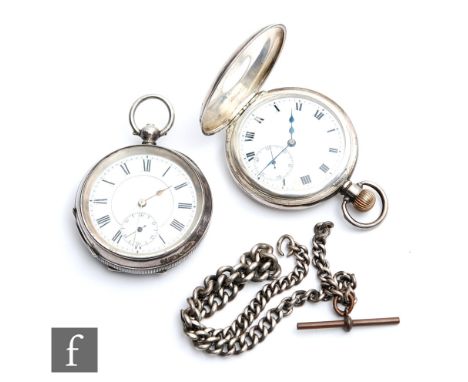 A hallmarked silver half hunter crown wind pocket watch, Roman numerals to a white enamelled dial, case diameter 52mm, moveme