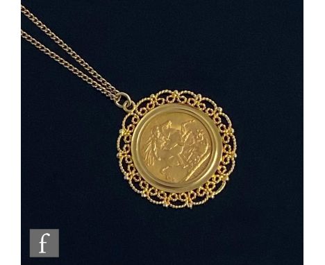 A Victorian full sovereign dated 1900, loose set to a pendant mount and suspended from a fine curb chain, total weight 14.5g.