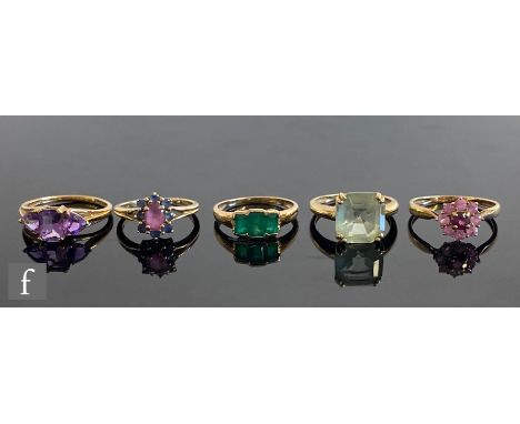 Five 9ct hallmarked stone set rings to include amethyst, emerald and ruby examples, total weight 11g, various styles and size