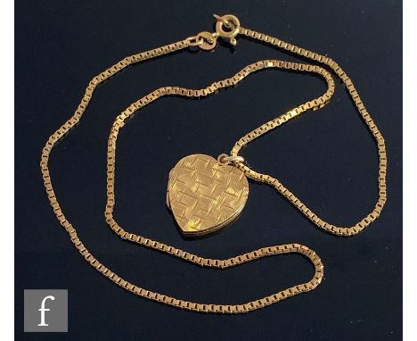 A 9ct hallmarked heart shaped locket with a matt finish suspended from a 90ct box chain, total weight 9.3g, length of chain 4