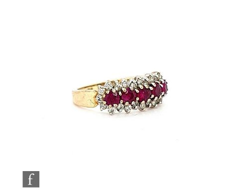 A 9ct hallmarked ruby and diamond ring, five central rubies claw set within a border of diamonds, weight 3.3g, ring size L 1/