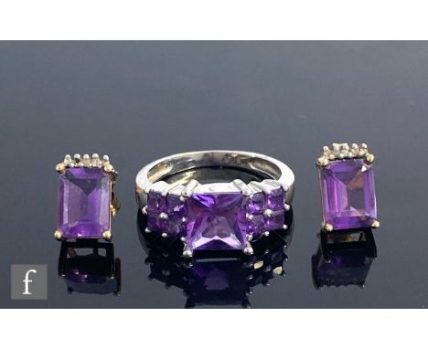 A 9ct white gold amethyst nine stone ring, all stones square cut and claw set, weight 3.3g, ring size L, with a pair of 9ct a