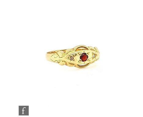 An early 20th Century 18ct hallmarked ruby and diamond gypsy set three stone boat shape ring, weight 2g, ring size O, Chester