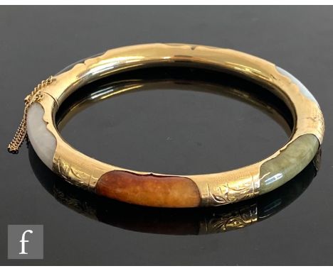 A mid 20th Century 14ct hinged bangle set with six polished agate inset panels to include carnelian onyx etc, weight 26.5g, i