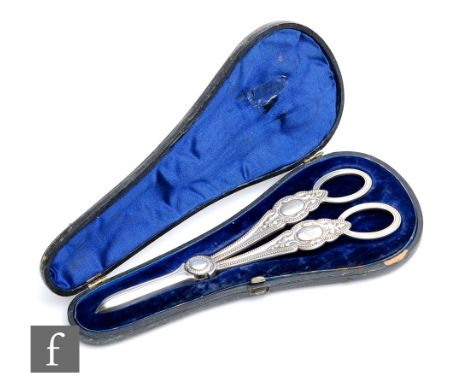 A pair of Victorian hallmarked silver grape scissors with beaded borders, weight 3.5oz, length 17cm, within a fitted case, Sh