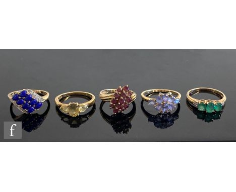 Five 9ct hallmarked stone set rings to include emerald, ruby and lapis lazuli examples, total weight 12g, various styles and 