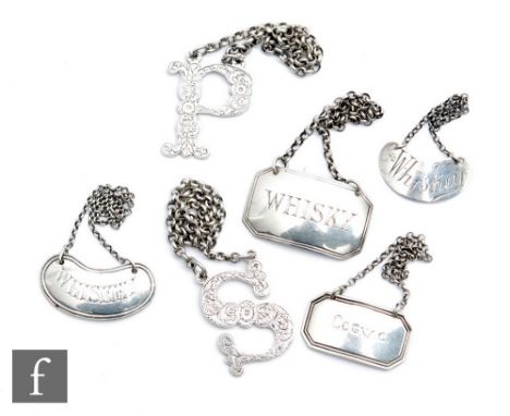 Six assorted Georgian and later hallmarked silver decanter labels to include two "cut out" letters S and P, three whisky and 