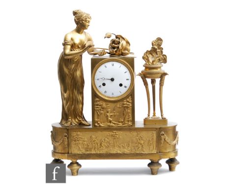 A 19th Century French eight day bell strike mantle clock, Roman numerals to a white enamelled central circular dial flanked w