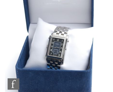 A gentleman's stainless steel Rotary Elite Reverso quartz wrist watch, a rectangular white dial with batons and Arabic numera