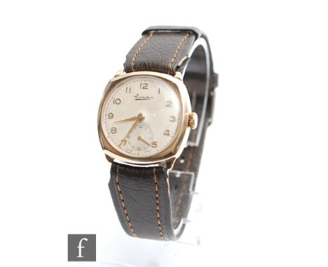 A mid 20th Century gentleman's 9ct Everite manual wrist watch, Arabic numerals to a cream dial, case diameter 30mm, to a brow