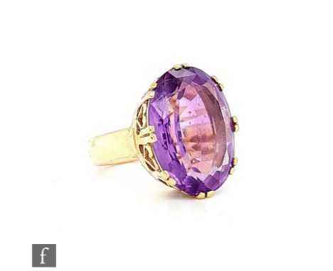 A 9ct hallmarked single stone amethyst ring, claw set oval stone length 20mm, claw set to a plain shank, weight 11.5g, ring s
