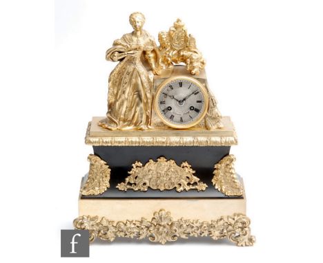 A late 19th Century French ormolu figural mantel clock, detailed with a figure of Queen Victoria beside the coat of arms, rai