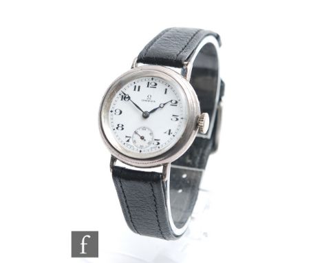An early 20th Century gentleman's Omega manual wind wrist watch, Arabic numerals to a white enamelled dial, case diameter 34m